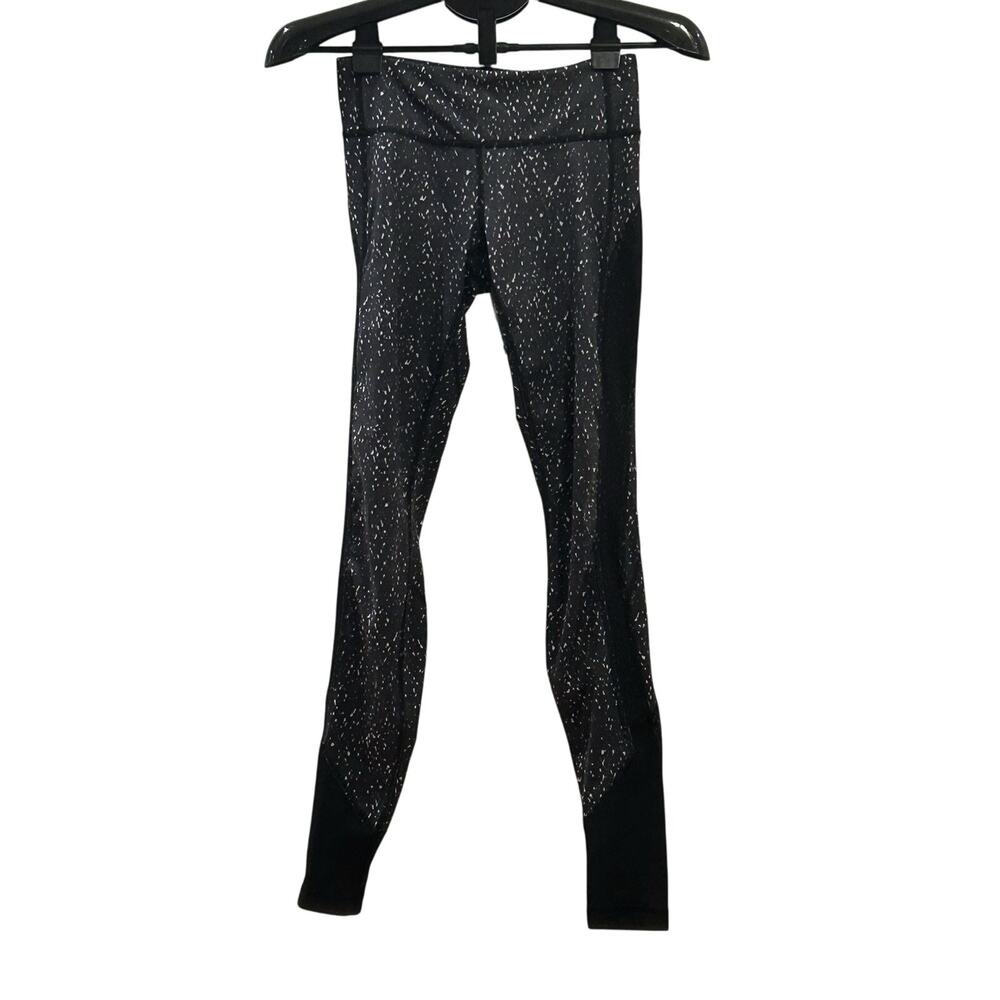 Lululemon Women's size 4 Black Speckled Leggings with Mesh Cut Outs